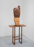 wood shape on pedestal