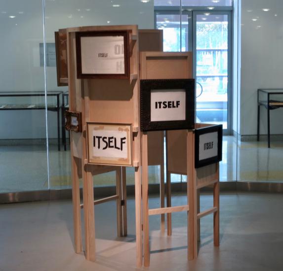 wood sculpture with words 
